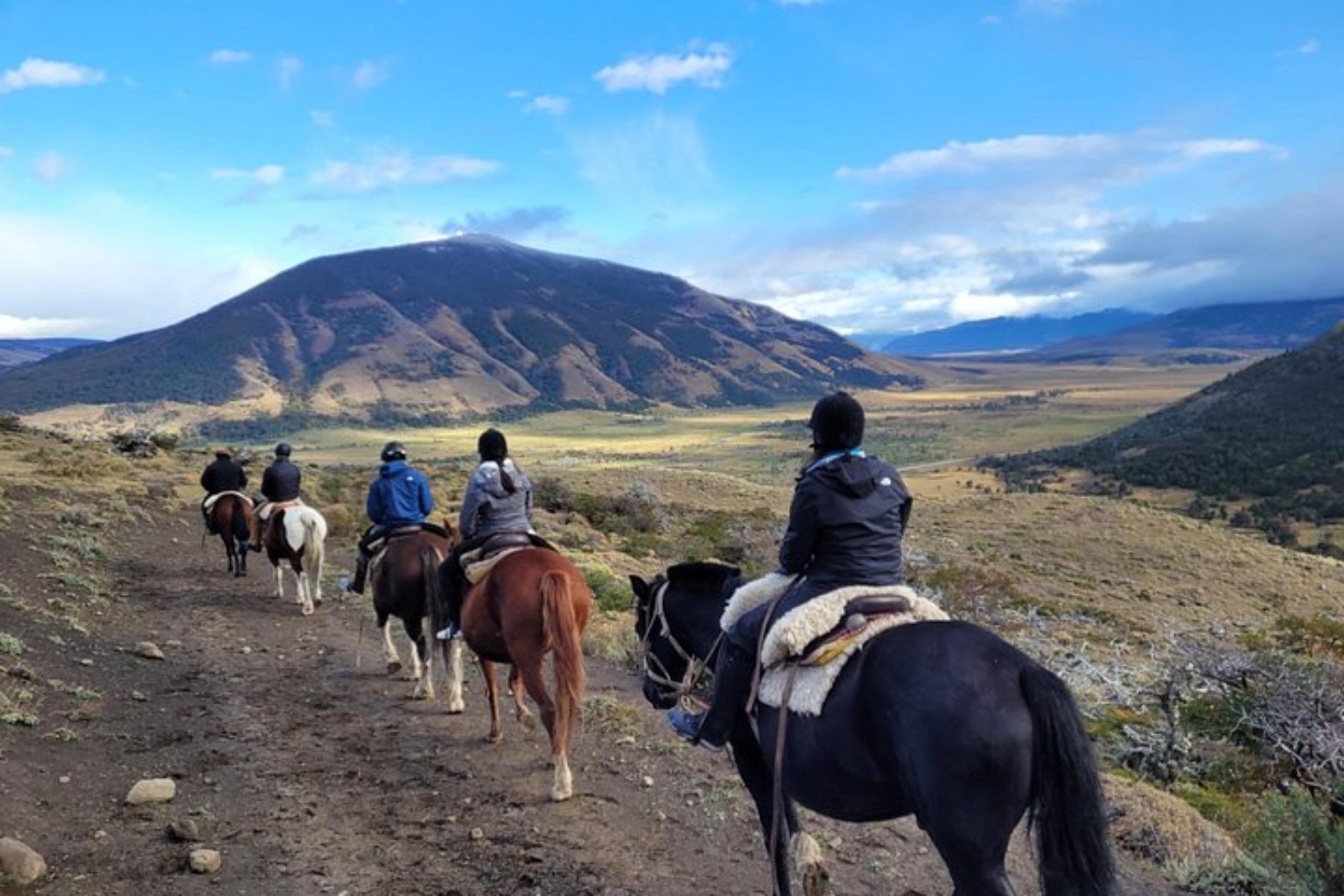 Guests riding through the valley